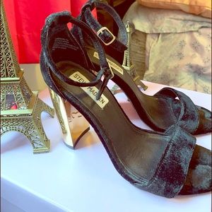 Black and gold colors heels